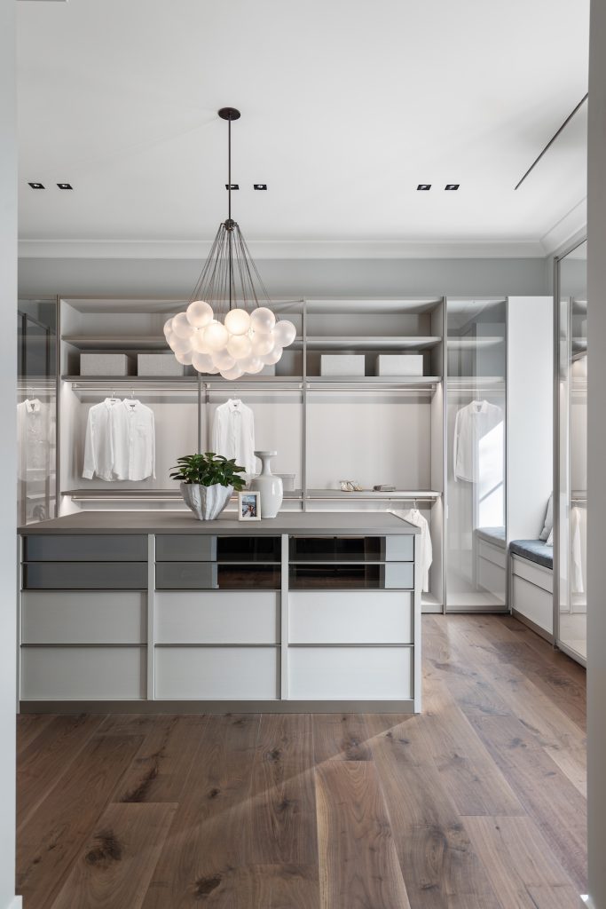 Solera Isle project by brooks design studio primary closet