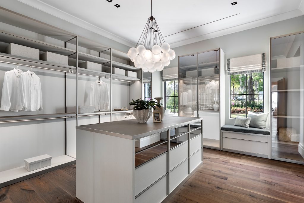 Solera Isle project by brooks design studio primary closet